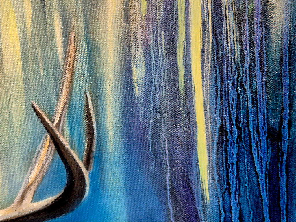 "Detail of deer antlers against a blue and golden dripping background, close-up of original painting Touched by the Light by Annikaprana"