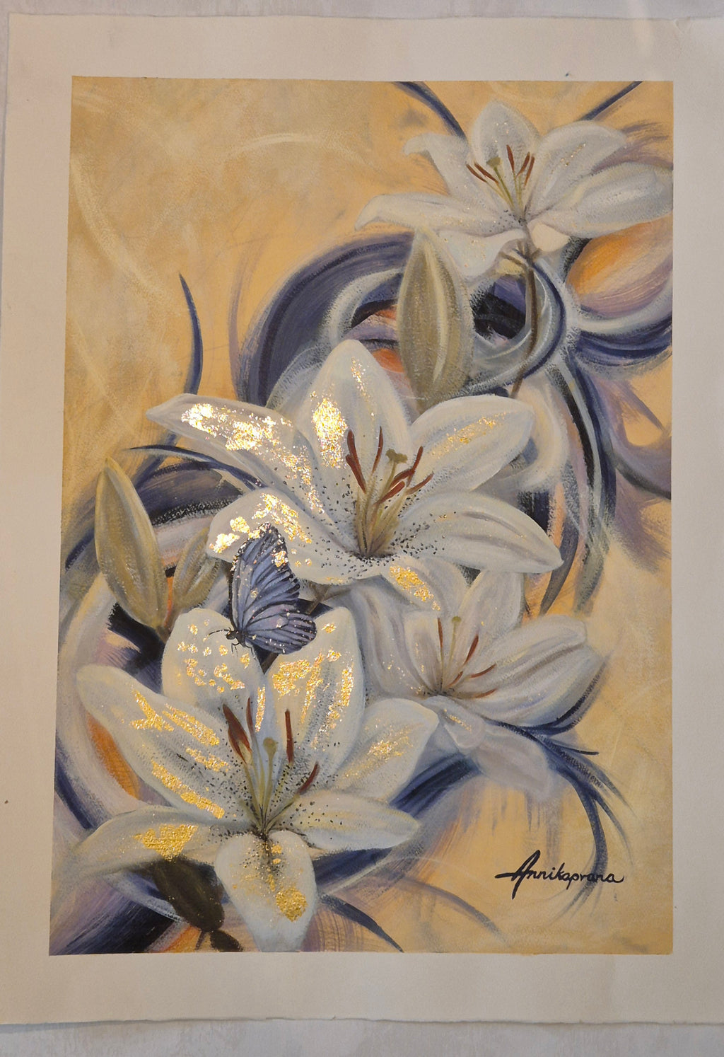 "Revealing the Gold Within — original painting by Annikaprana, white lilies and a blue butterfly with Gold Metal Leaf details on a warm golden background, Mixed Media Acrylic and Oil on Fabriano paper, unframed full sheet with white border, signed"