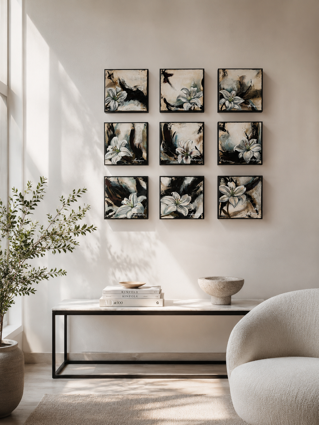 Nine framed canvas prints arranged in a 3×3 grid, each featuring abstract white lilies against a dark, expressive background in black and beige tones. Displayed in a Nordic, gallery-inspired interior setting.