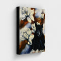 Feeling Small in a Big World — Canvas Print by Annikaprana. Close-up side view showing black 4 cm gallery wrap edges. Black bear with white magnolia flowers on canvas, 13×16″ (33×40 cm).
