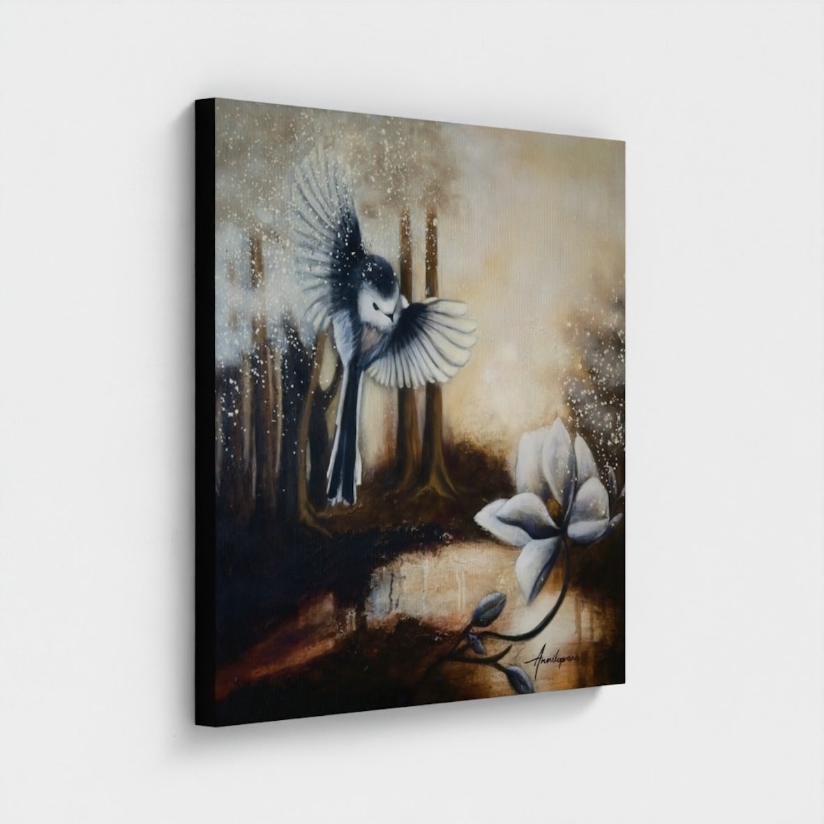 Sunshine After Rain 2026 — Canvas Print by Annikaprana. A long-tailed tit in flight above a white magnolia flower in a misty golden forest. Giclée print on canvas, black 4 cm gallery wrap, ready to hang.