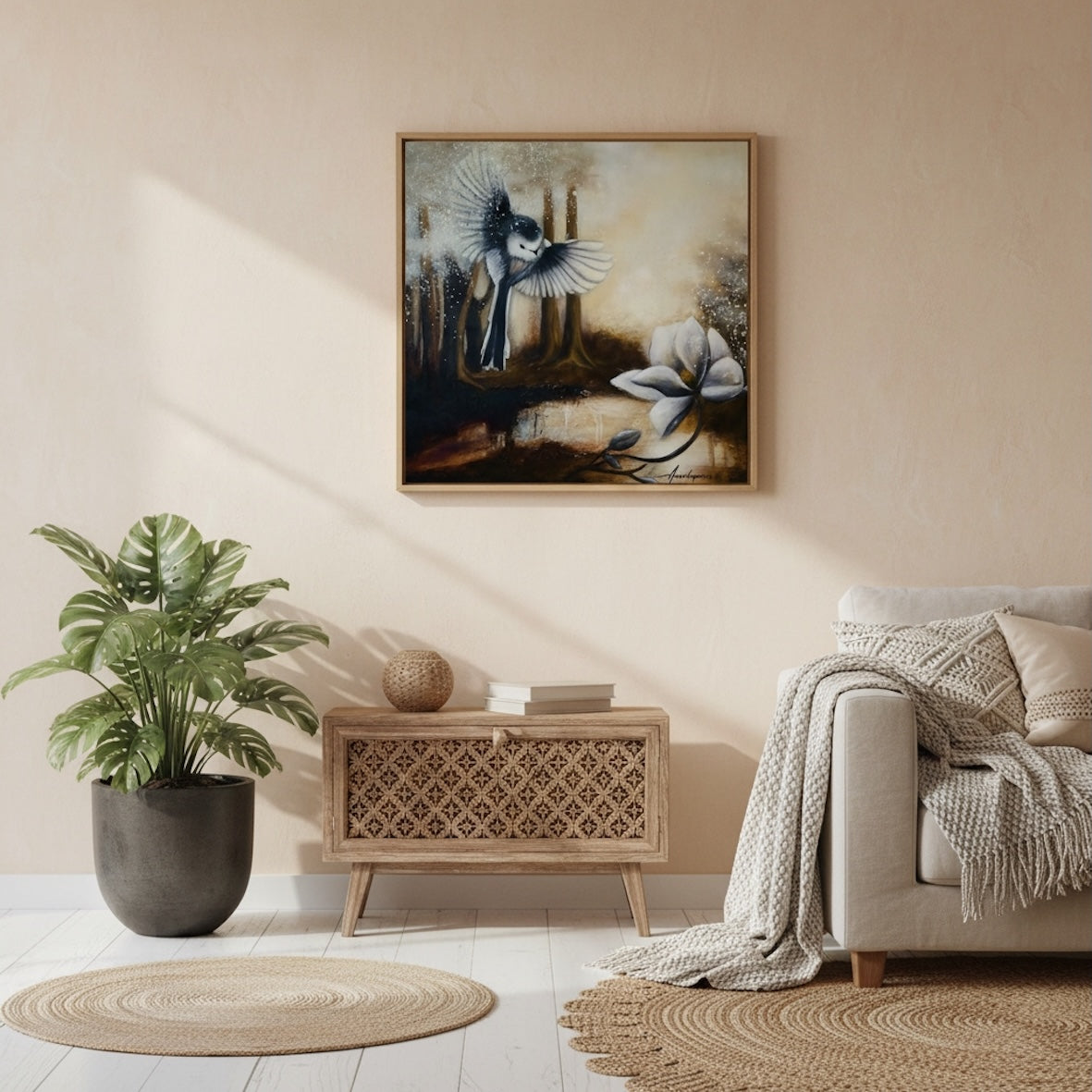 Sunshine After Rain 2026 — Fine Art Print by Annikaprana. A long-tailed tit in flight above a white magnolia in a misty golden forest. Framed print displayed in a warm Scandinavian living room. Giclée on Hahnemühle German Etching 310gsm, white border, ready to frame.